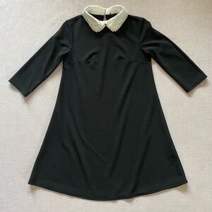 Black pearl mini babydoll dress.